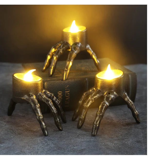 Halloween Break The Arm Skull LED-ljusstake – kuslig stämning i varje hörn!
